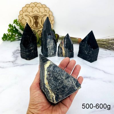 Black Tourmaline with Red Hematite Veins Semi Polished Points weight in 500-600g in hand for size reference