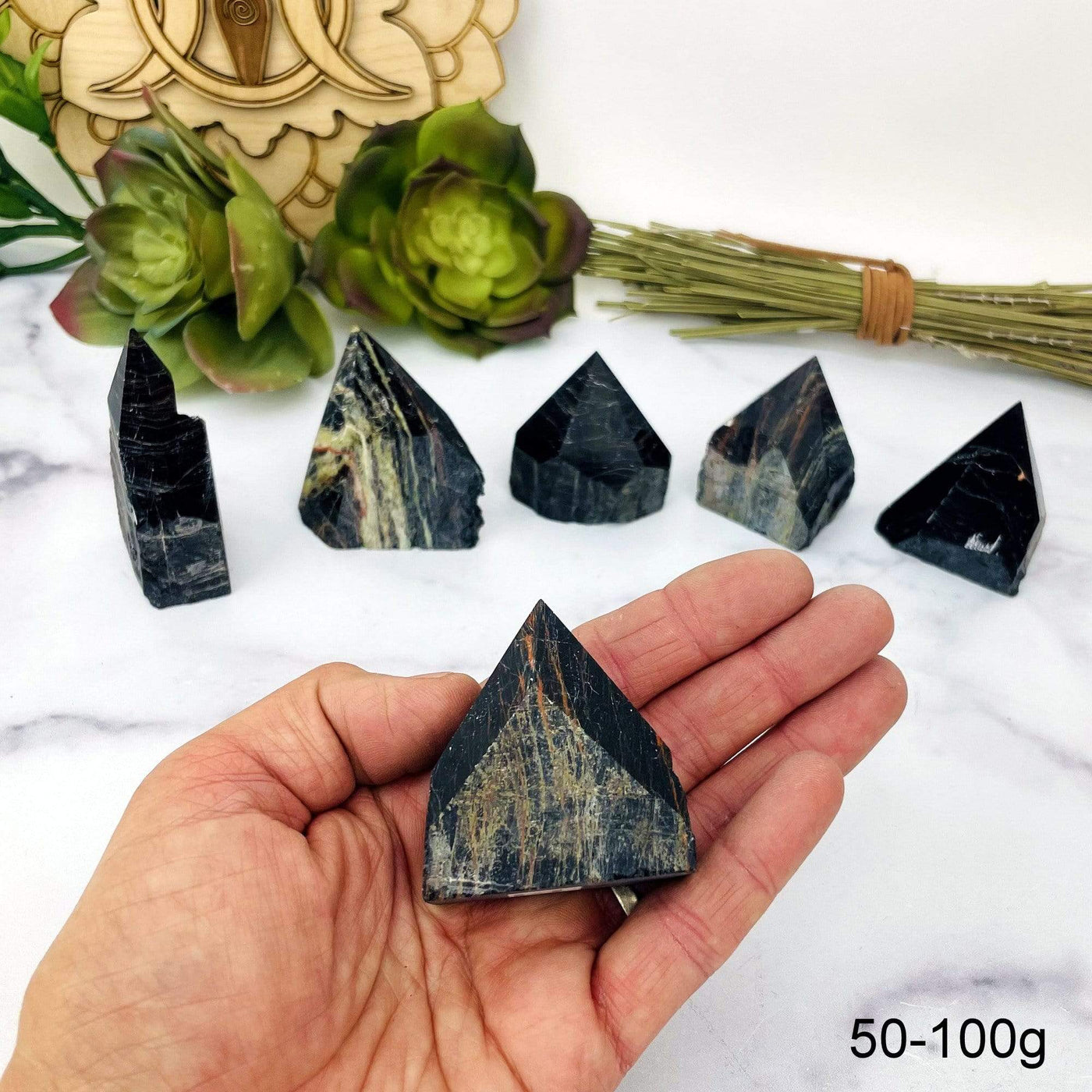 Black Tourmaline with Red Hematite Veins Semi Polished Points weight in 50-100g in hand for size reference