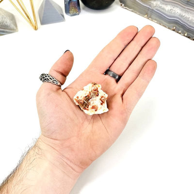 Natural Vanadinite - back view in a hand