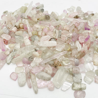 Kunzite 1lb Chips on a table
