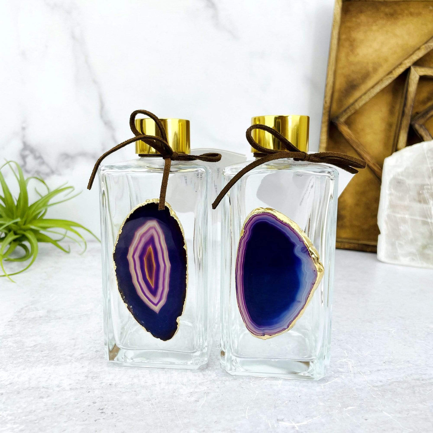 Picture of two of our Purple agate diffusers being displayed next to each other.
