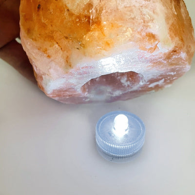 Himalayan Salt Candle Holder showing hole in bottom as an option to small light up the candle another way