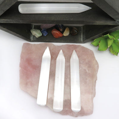 overhead view of three selenite wand points