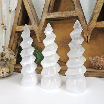 three selenite spiral towers on display for possible variations 