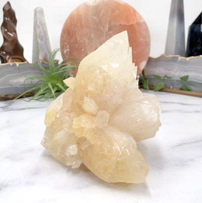 close up of calcite cluster on marble background