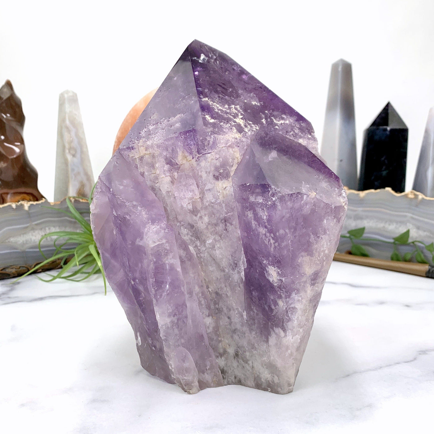 amethyst point on marble background