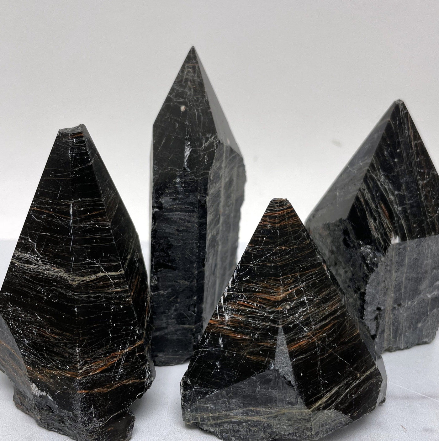Black Tourmaline with Red Hematite Veins Points side view for height and thickness reference