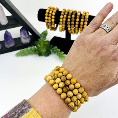 Four Palo Santo Round Bead Bracelets 8mm Beads around wrist