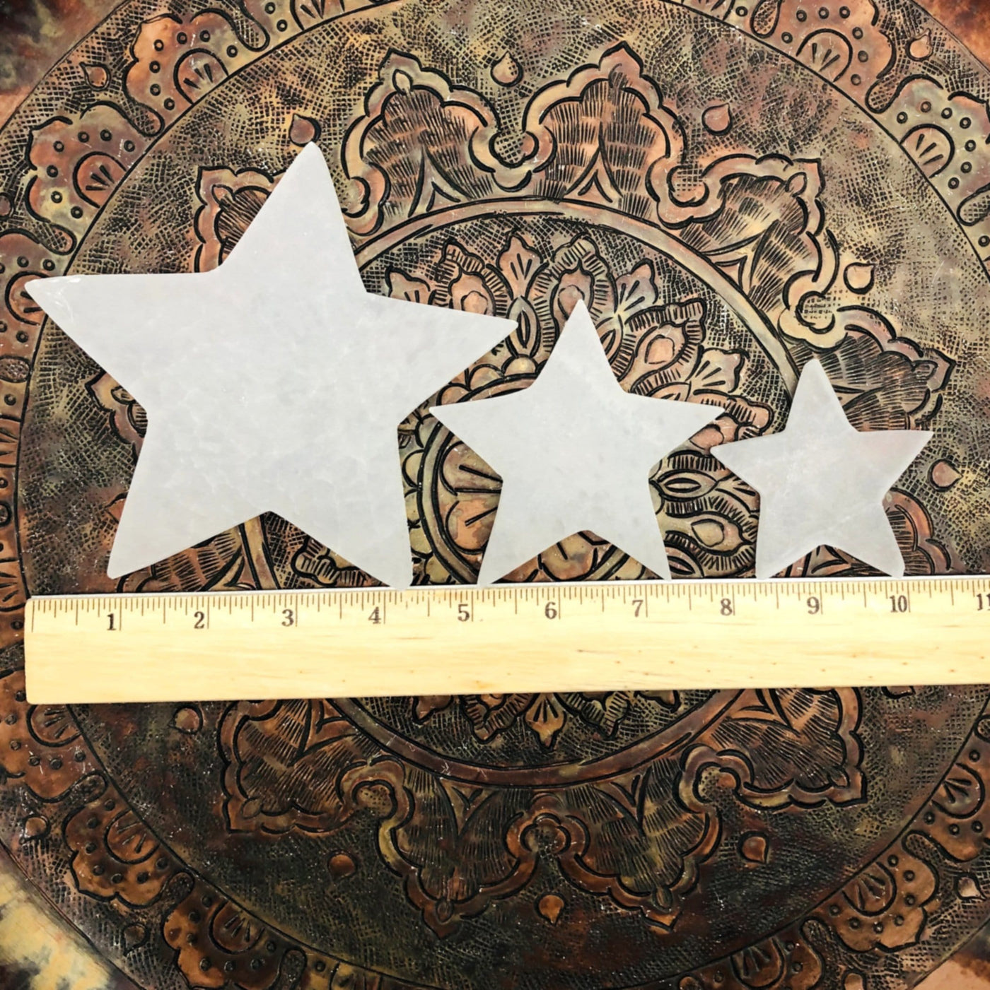 all selenite star size options with ruler for size reference