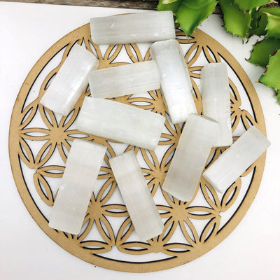 overhead view of many selenite rectangle bars on display