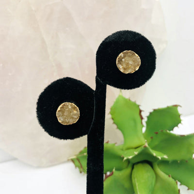 up close shot of Druzy Stud Earrings in 24k Gold Electroplated on earring stand