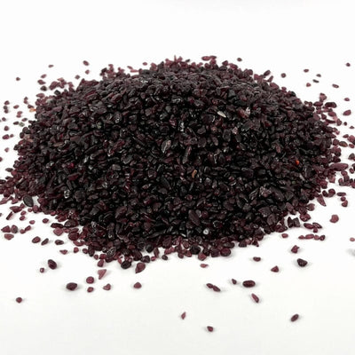 one pound of small garnet chips displayed on a white background 
