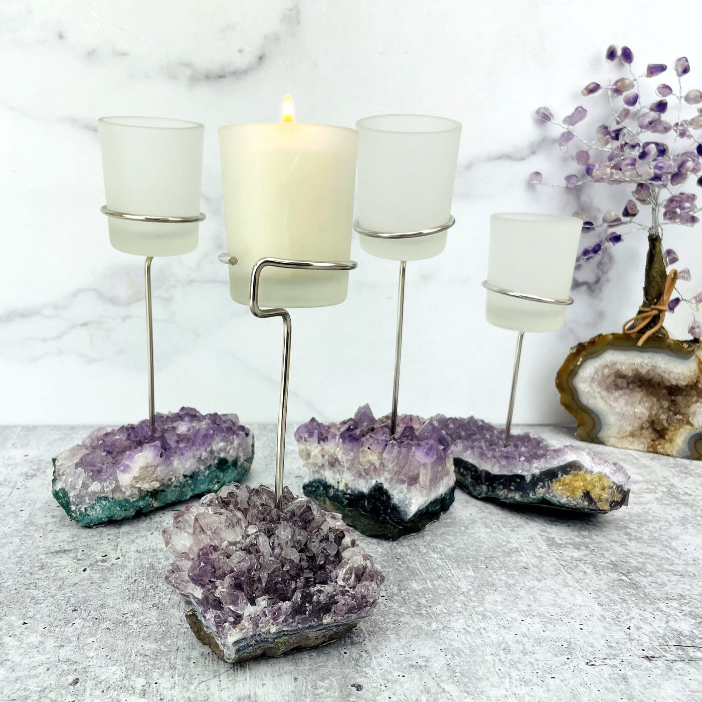 Picture of 4 amethyst candle holders.