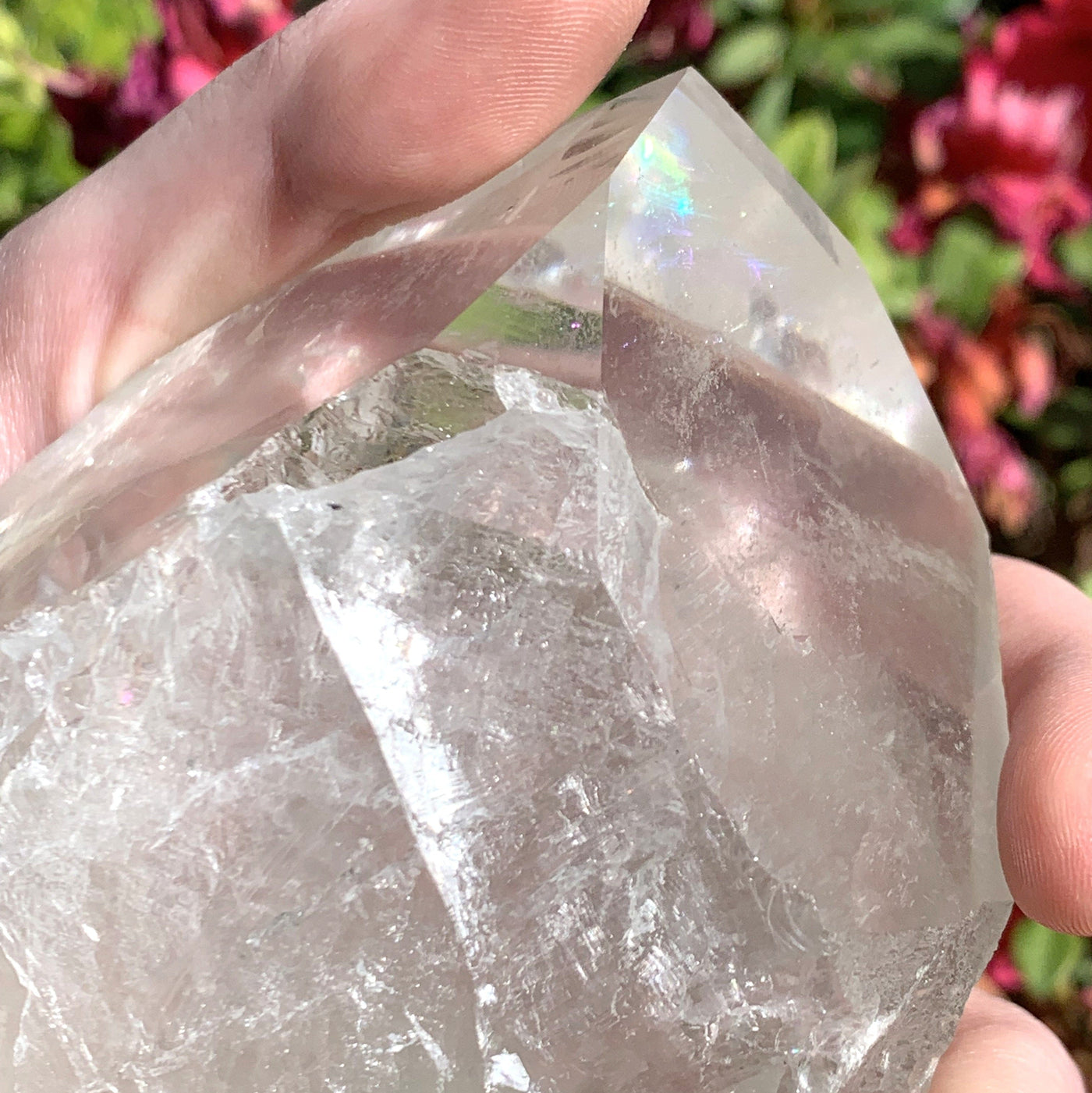 A beautiful close view of the Crystal Quartz with a rainbow on top of the stone piece