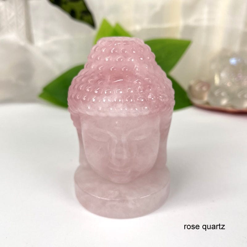 close up of the details on the rose quartz buddha head 