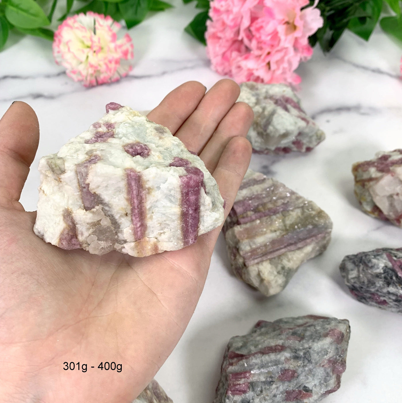 atural Pink Tourmaline with Mica on Matrix - 1 in a hand