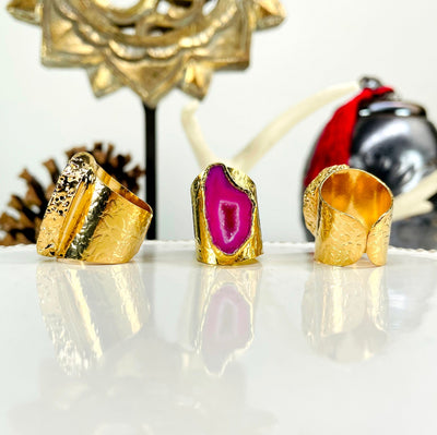 close up of three colored agate druzy gold adjustable rings for side, front, and back view