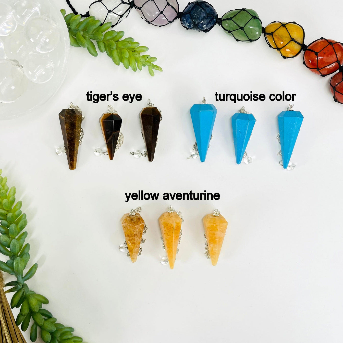 three tiger's eye, turquoise color, and yellow aventurine pendulum pendants on white background for possible variations