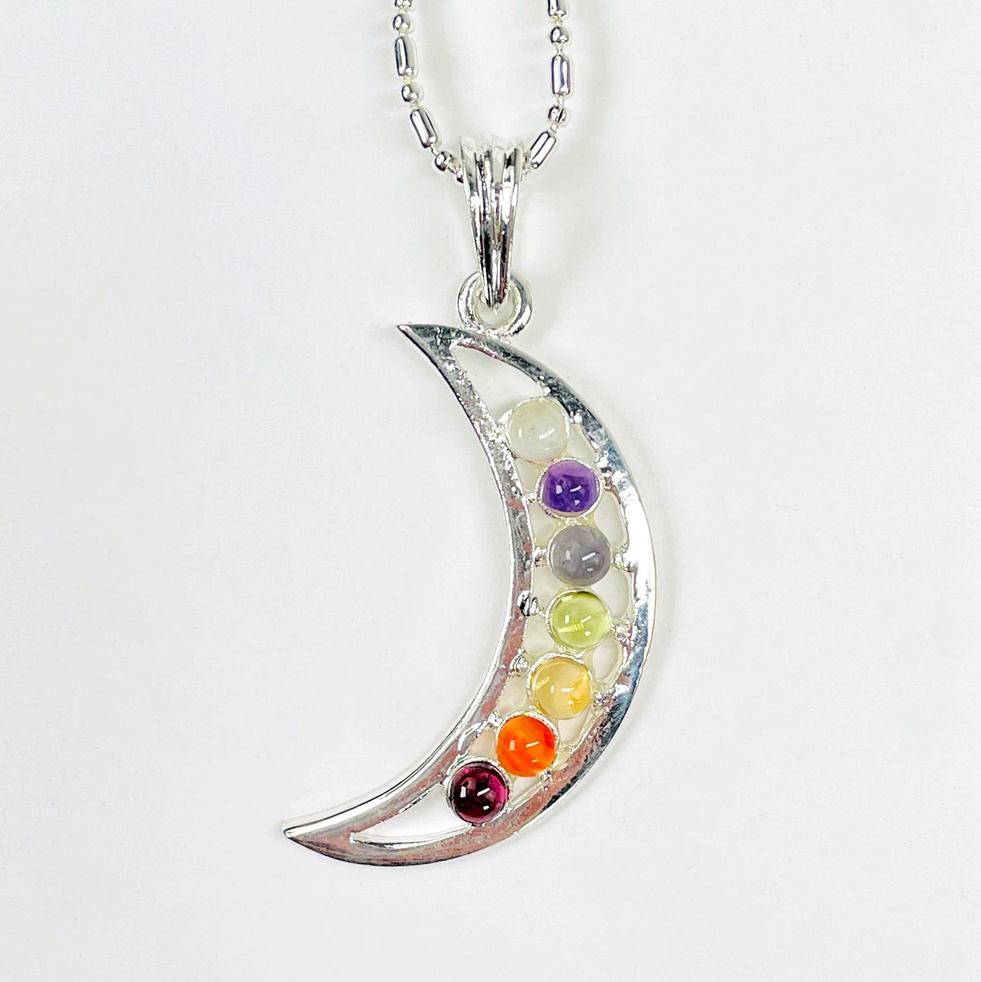 close up of one chakra crescent moon pendant necklace for details