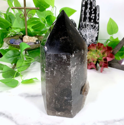 Products Natural Smoky Quartz Point - on a table