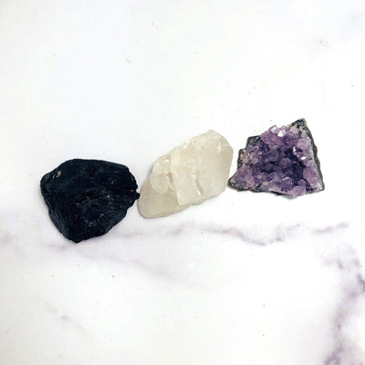 tourmaline, crystal quartz, and amethyst clusters