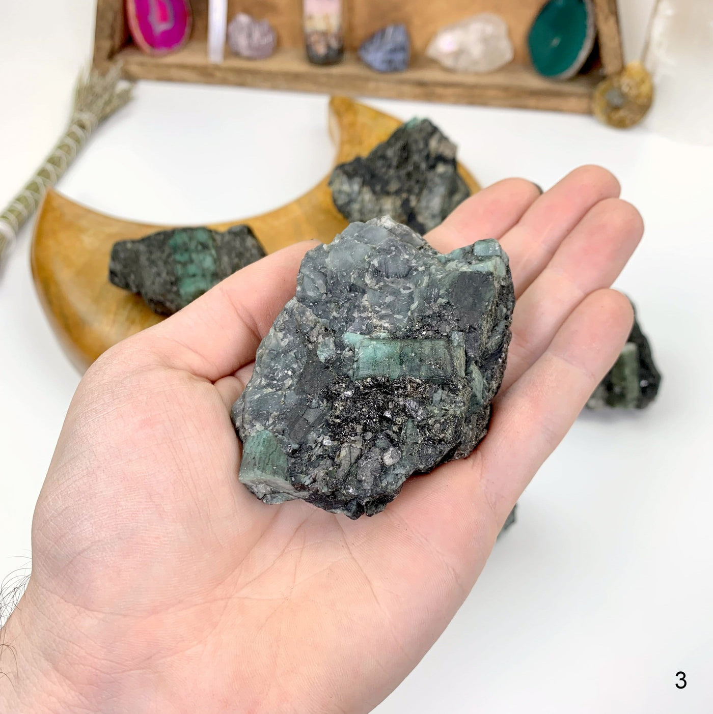 emerald in a hand.