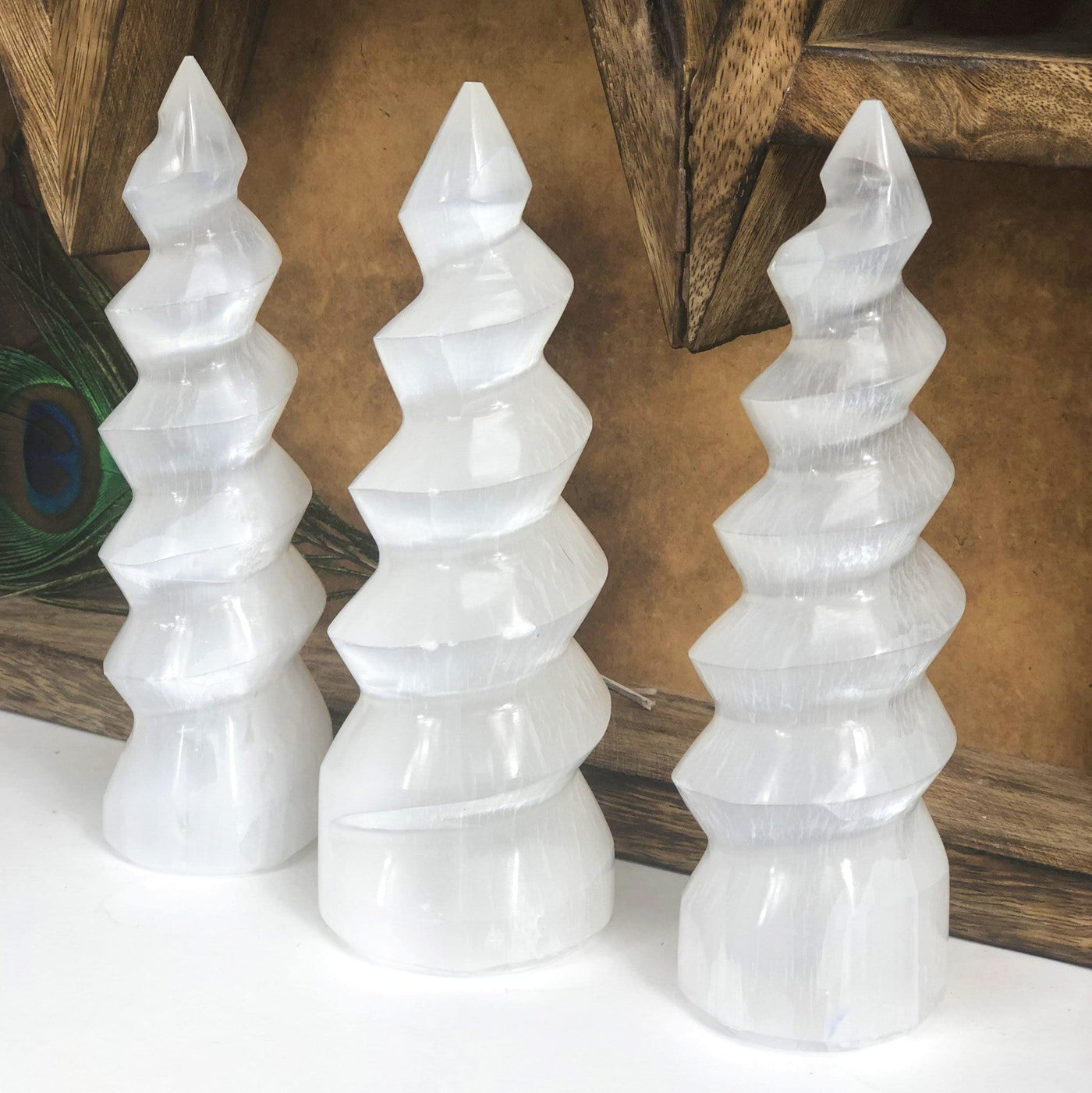 three selenite spiral towers on display for possible variations