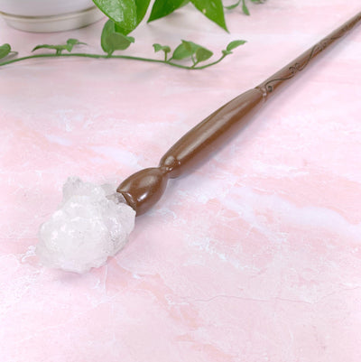 up close shot of White Geode - Enchantment Wand on pink background