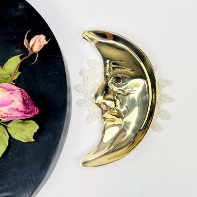 brass moon tray set up as home decor 