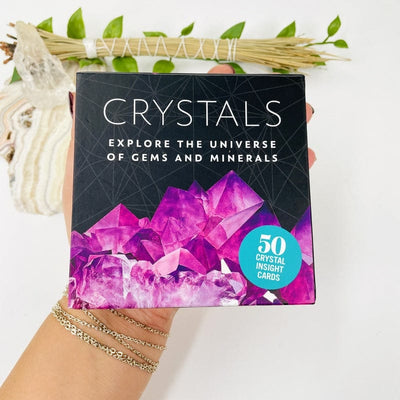 crystals card deck in hand for size reference 