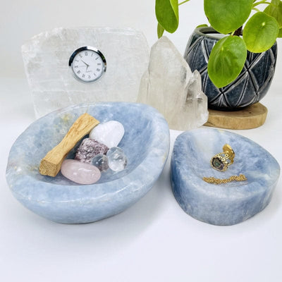 blue calcite bowls displayed as home decor. can be used to put pocket stones and jewelry in