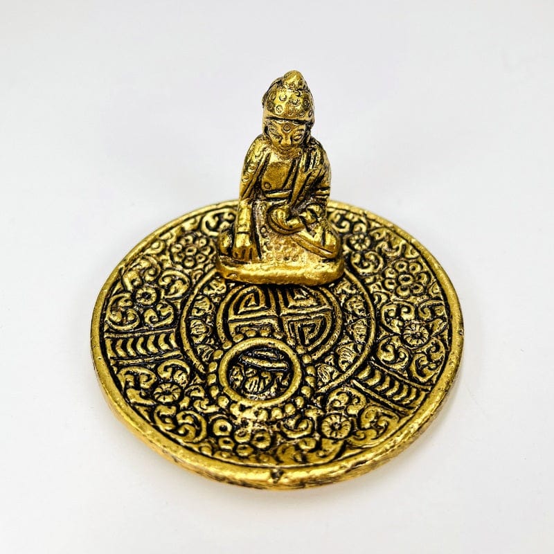 close up of the buddha cone burner in gold 