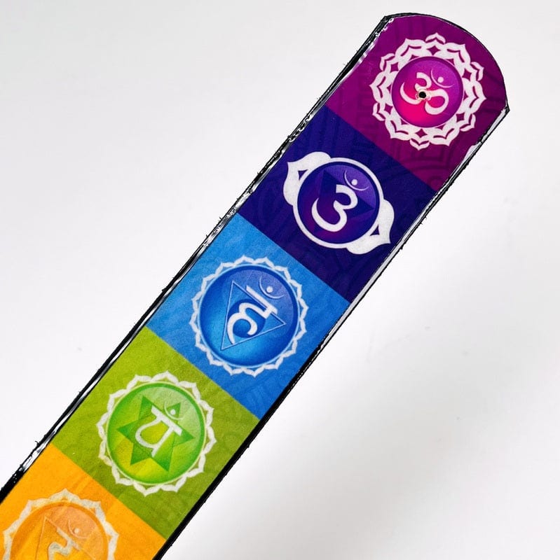 close up of the colorful details on the seven chakra incense holder 