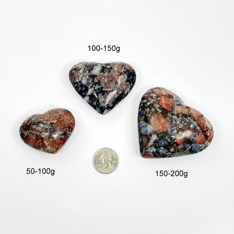 rhyolite hearts next to a quarter for size reference 