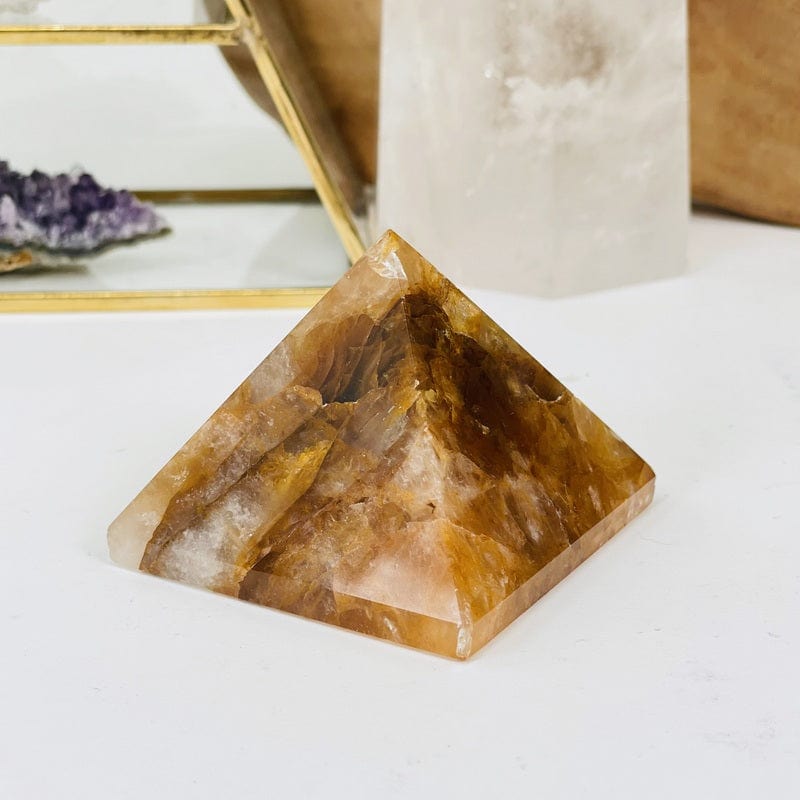 golden healer pyramid set as home decor 