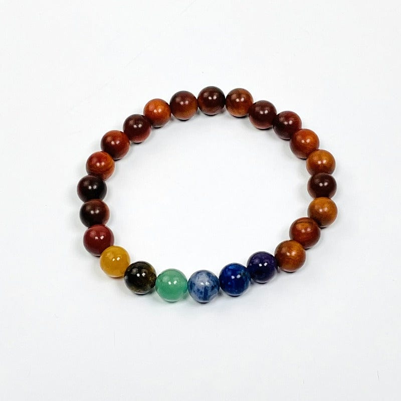 close up of chakra bead bracelet with sandalwood