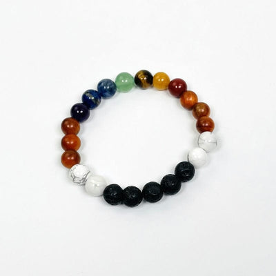close up of chakra round bead bracelets