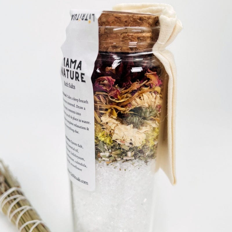 close up of herbs and flowers in the bath salts jar 