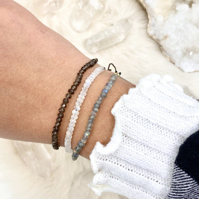 Gemstone Bracelets in smoky quartz, labradorite and moonstone on a wrist