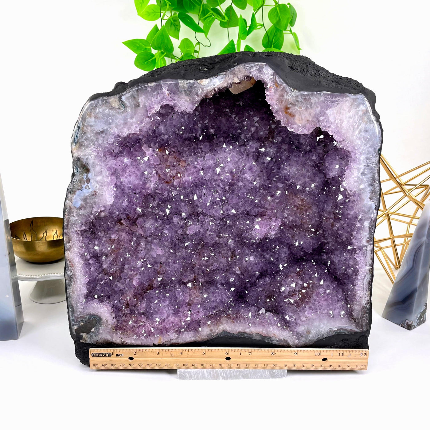 front of amethyst cave geode with horizontal ruler for width
