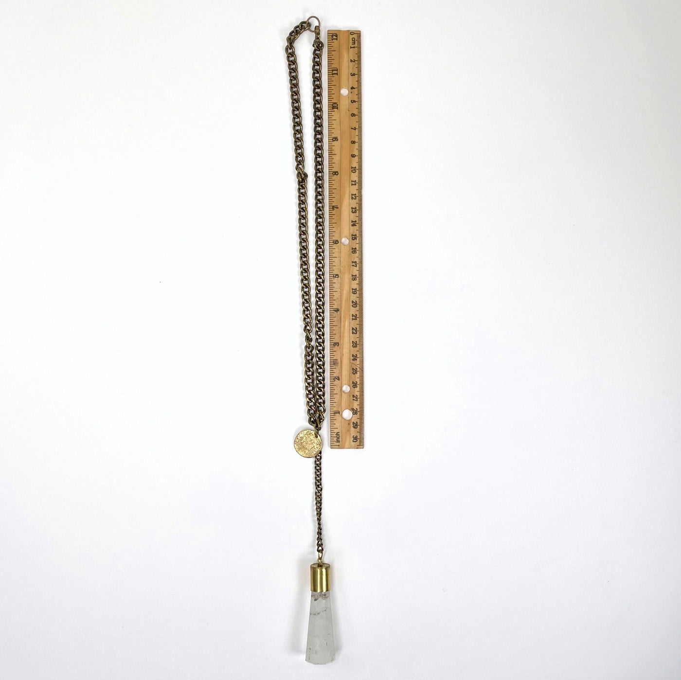 full necklace length on white background with ruler for length reference