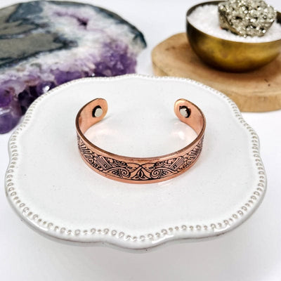 copper bracelet with engraved design 