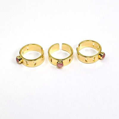 different angles of gold moon phase adjustable rings with rose quartz center accent