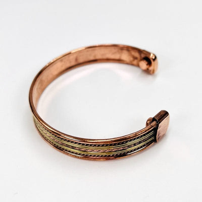 side view of the copper bracelet to show that the design goes all the way around 