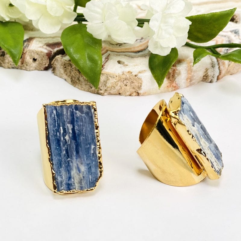 side view of blue kyanite gold cigar band adjustable rings