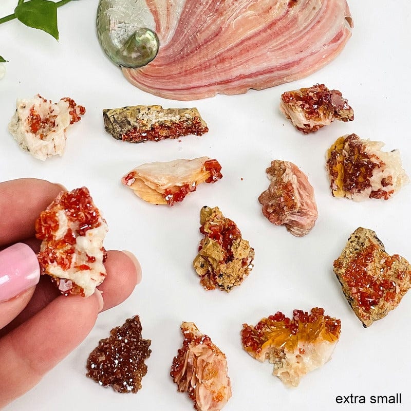 Natural Vanadinite - several on a table