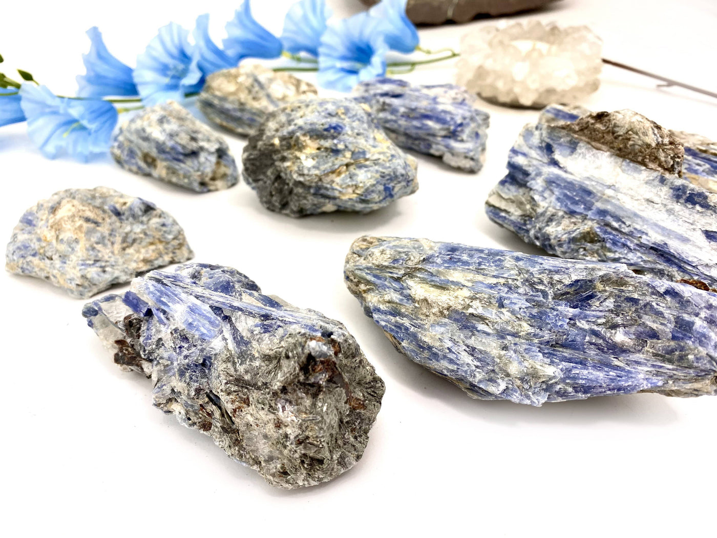 side shot of natural blue kyanite clusters displaying thickness 