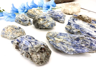 side shot of natural blue kyanite clusters displaying thickness 