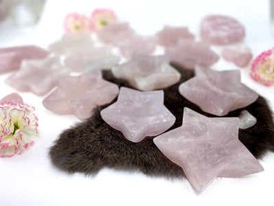 Angled shot of Rose Quartz Stone Star Dishes with decorations in the background