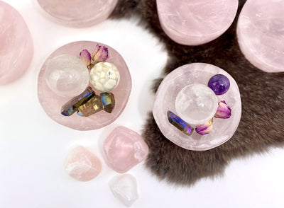 2 Rose Quartz Stone Round Dishes filled with crystals with others in the background